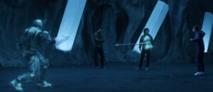 Jonathan fights Steel armor hologram as Clark and Jordan look on